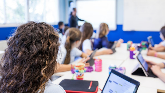 Digitalization Students work with tablets in the classroom